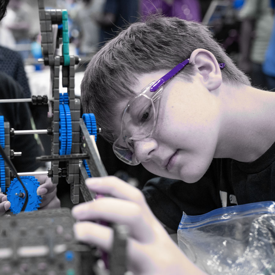 Student works on her robot.