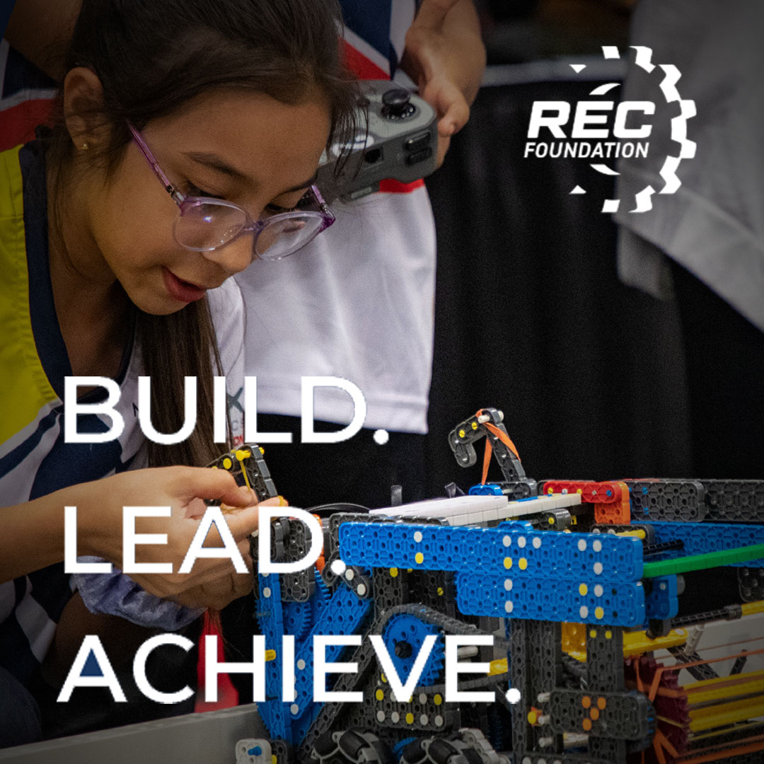 Girl participant works on her robot