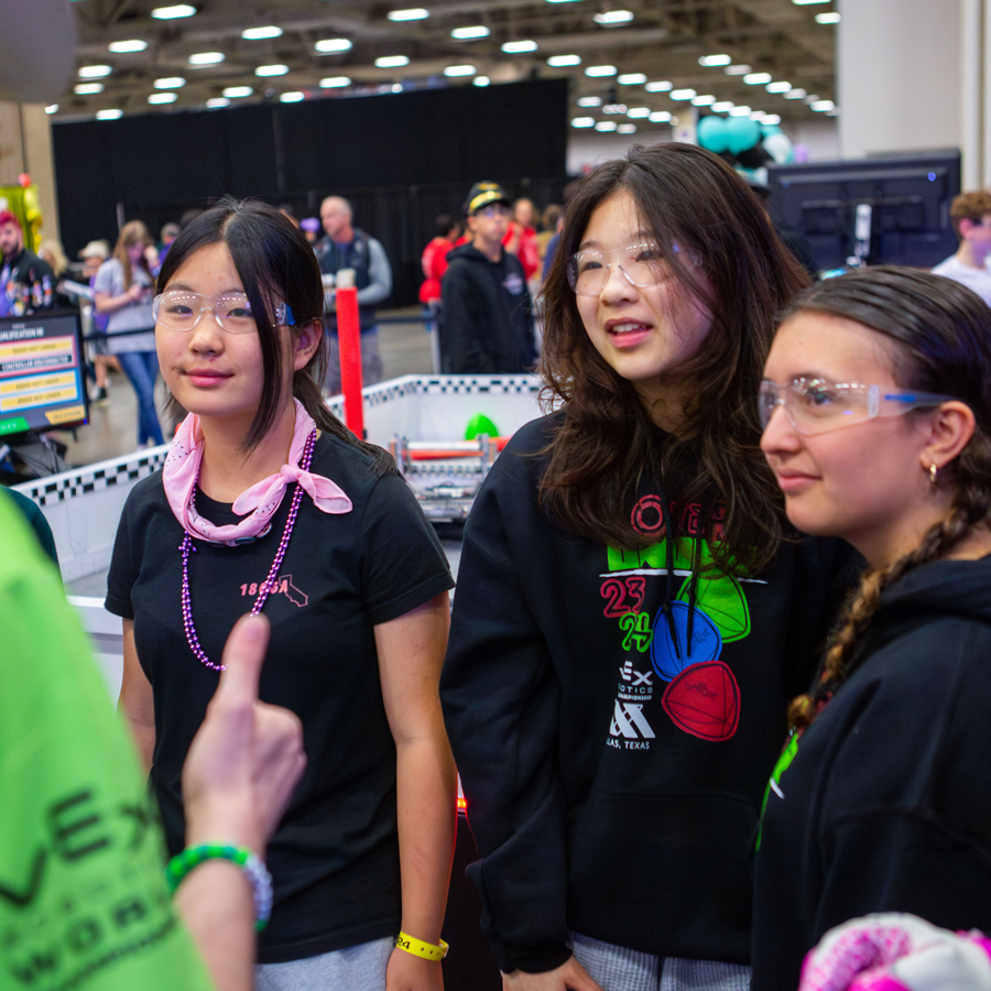 Team speaks to volunteer at VEX Robotics World Championship