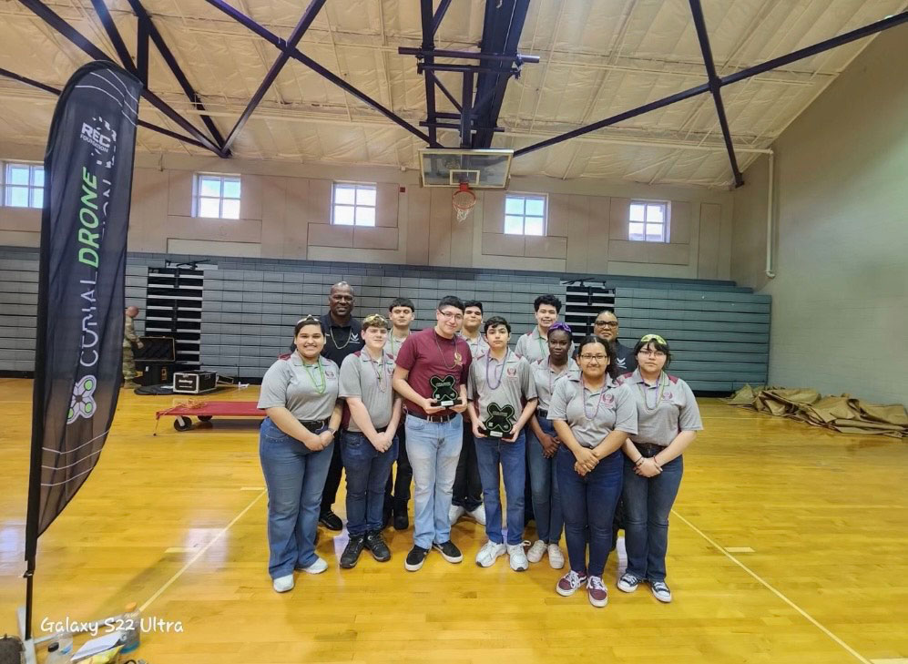 Ifeoluwa Ogunfolu with her drones team