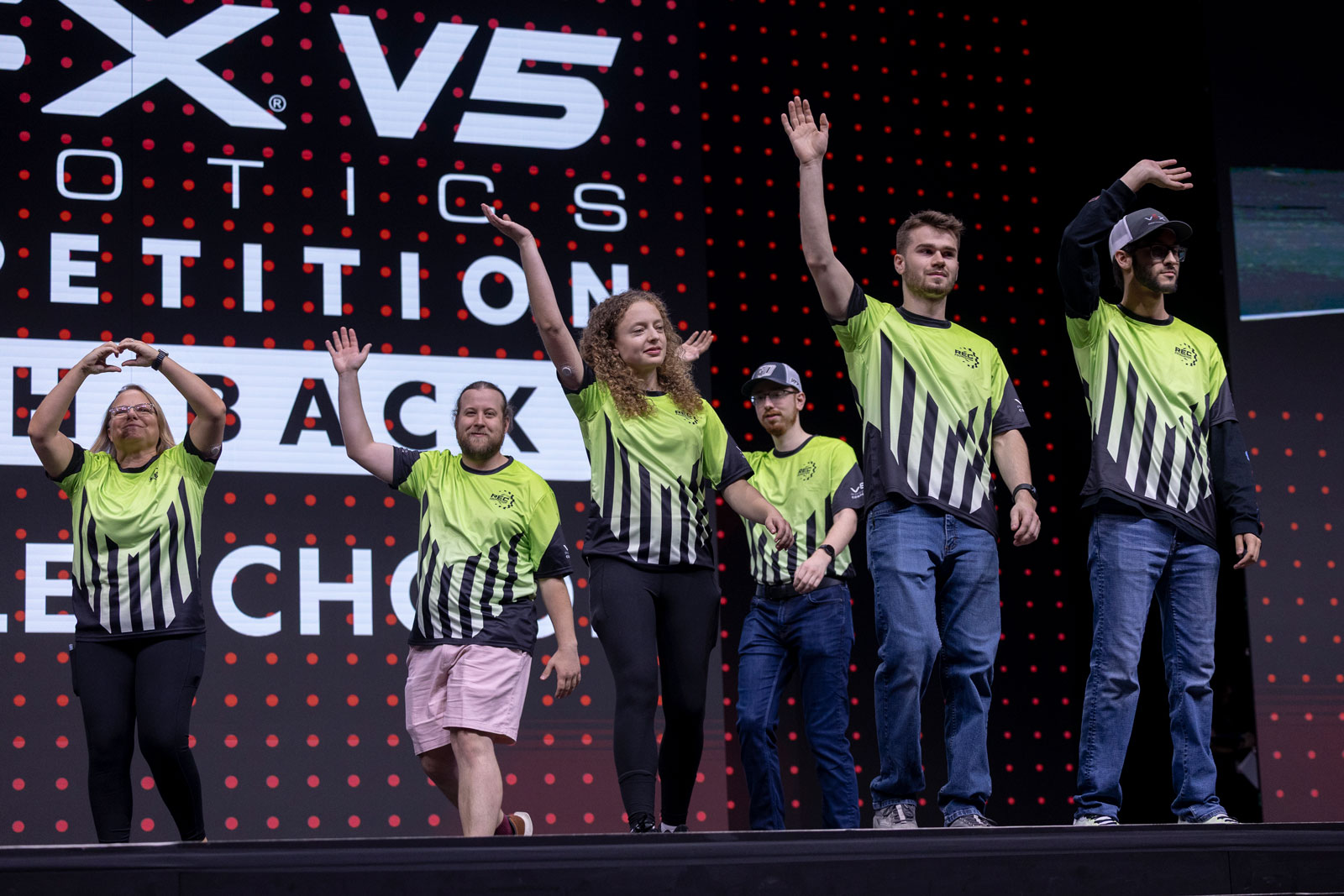 Referees waves at the crowd at the VEX Robotics World Championship