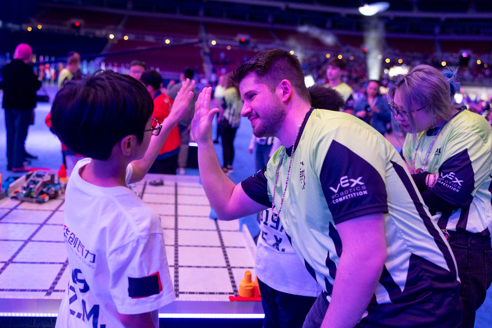 Referee hi-fives a participant